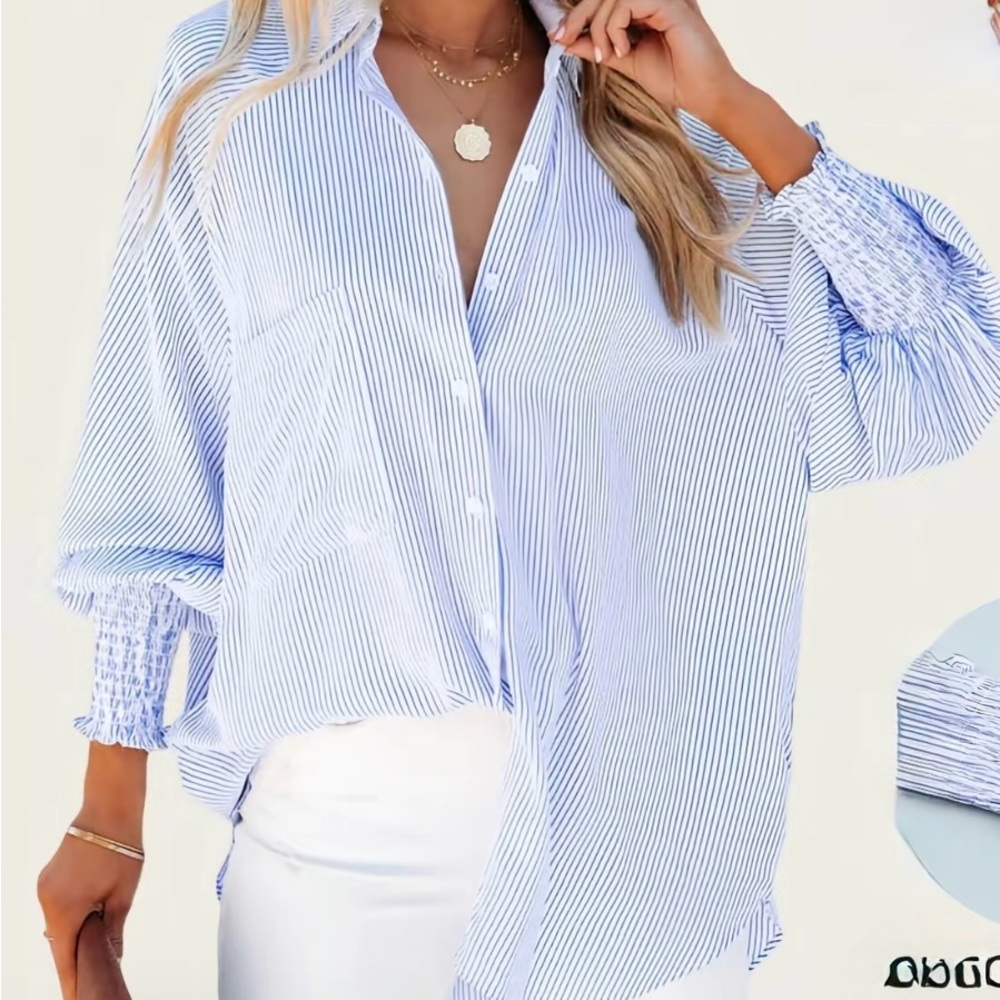 As vivid Striped boyfriendShirt in Blue and White. Never been worn.